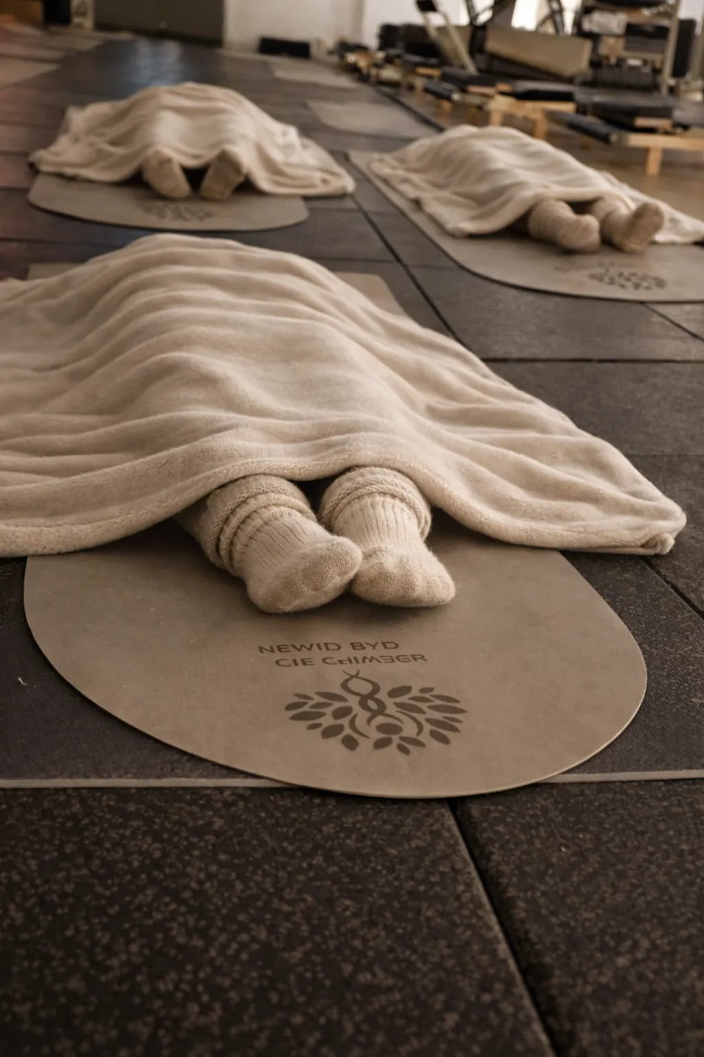 Life Changer Studio branded mats blankets and grip socks setup